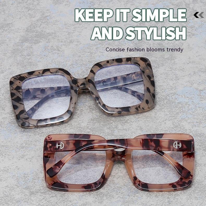 f6782f95-583c-4a55-9cd0-c0b1ce596627_trans.jpeg Retro Box Plain Glossy Eyeglass Frame - Image 1